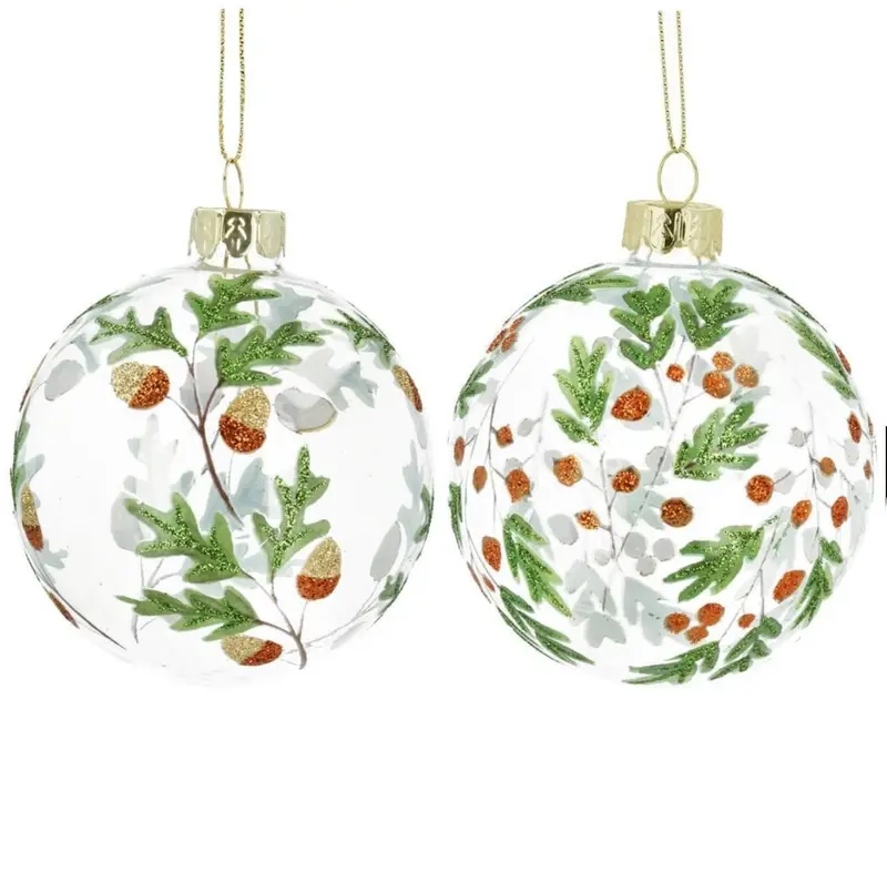 Bola de Navidad transparente con hojas y bayas
