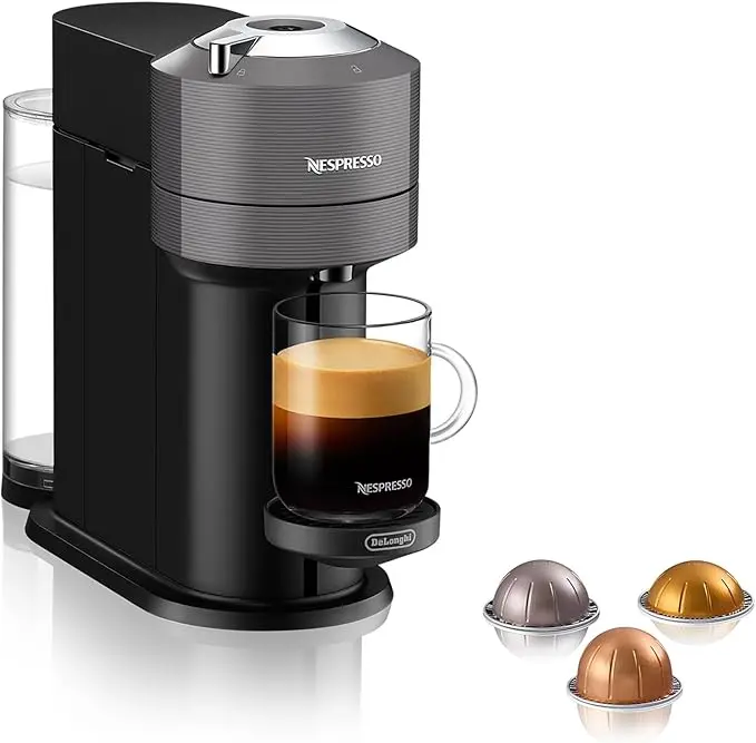 Cafetera Nespresso Vertuo Next de Magimix en Gris Oscuro. Una máquina automática para 5 tamaños de taza, con tecnología Centrifusion y conectividad inteligente.