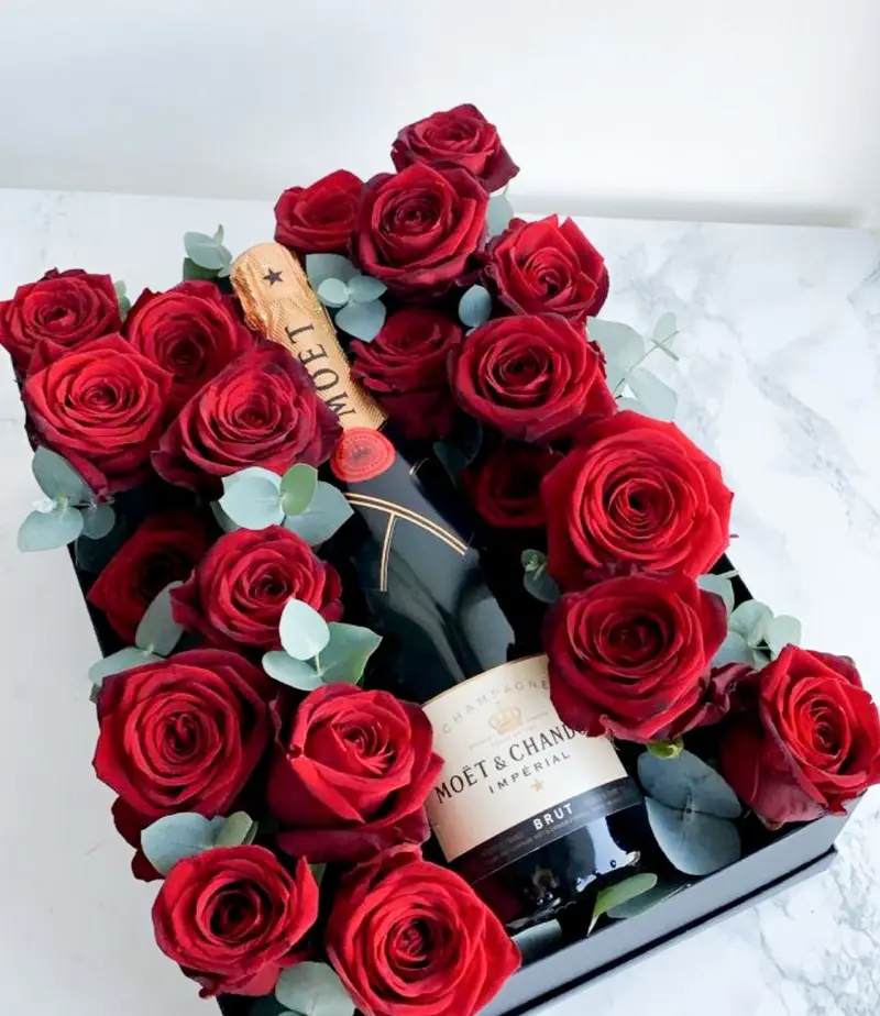Caja de rosas con moet