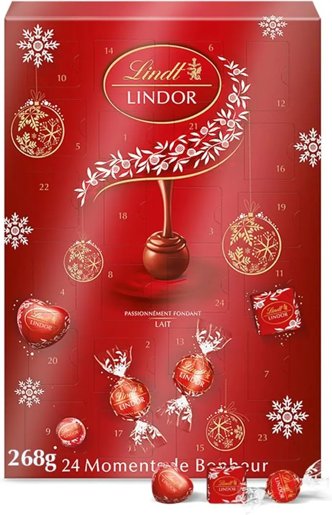 Calendario de Adviento Lindt LINDOR 2024, 268g de cremosidad irresistible. Con 24 bombones de chocolate con leche y corazón fundente para una Navidad mágica y deliciosa.