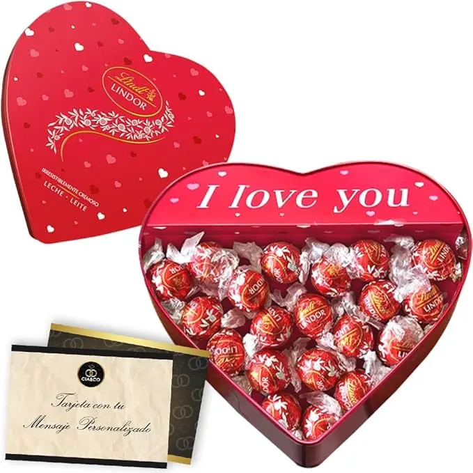 Lata de Corazón con 250g de Bombones Lindt Lindor y Tarjeta Personalizable Cia&Co. Un regalo de San Valentín o aniversario con cremosos bombones de chocolate con leche.
