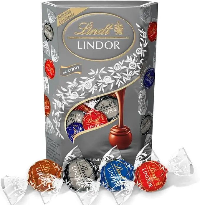 Lindt LINDOR Cornet Silver Surtido de Bombones, 337g. Una selección sofisticada para los paladares más exigentes, con bombones de chocolate con leche, avellana y negro 70%.