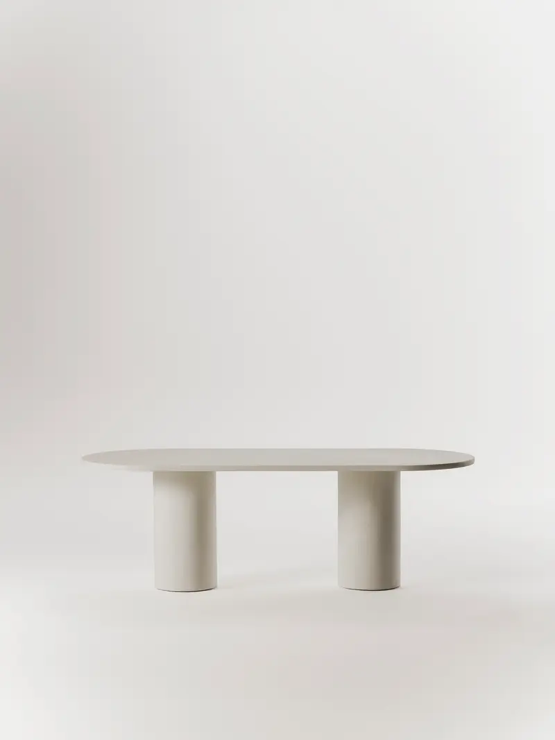 Mesa de comedor Reye ovalada de microcemento
