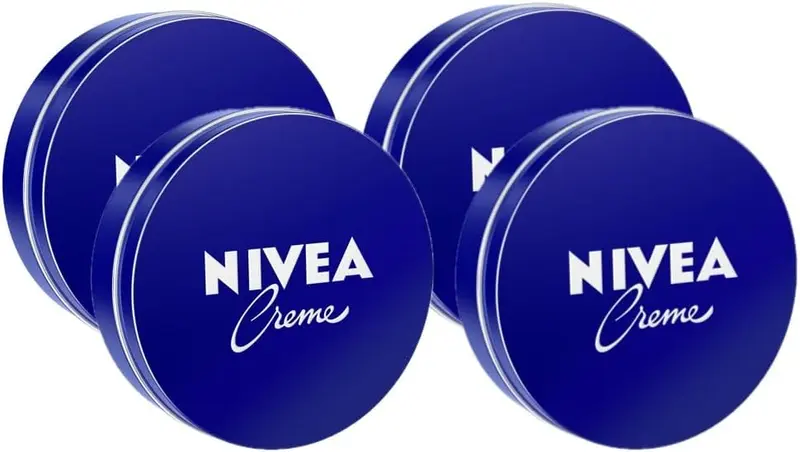 NIVEA Creme, Pack de 4 Latas de 75ml. El formato de viaje de la crema multiusos más icónica. Hidratación intensiva para llevar siempre contigo en el bolso, la maleta o el neceser.