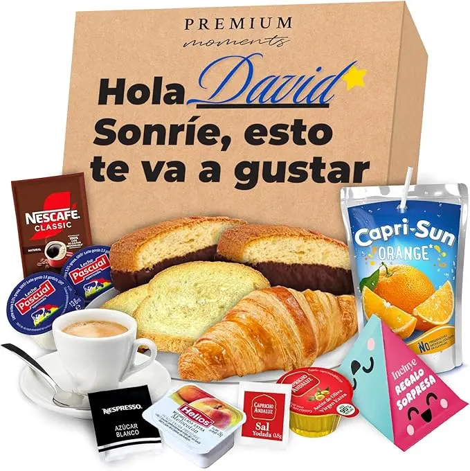Premium Moments Desayuno Sorpresa a Domicilio Mediterráneo. Una caja regalo personalizable con croissant, tostadas, zumo y café, ideal para cumpleaños y ocasiones especiales.
