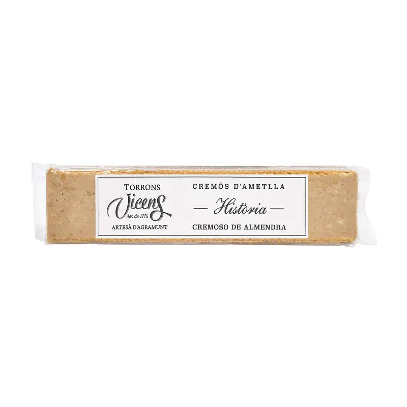 Torrons Vicens Turrón "Historia" Cremoso de Almendra, 300g. Una receta original recuperada por el maestro Àngel Velasco con almendra, avellana y un toque de galleta crujiente.