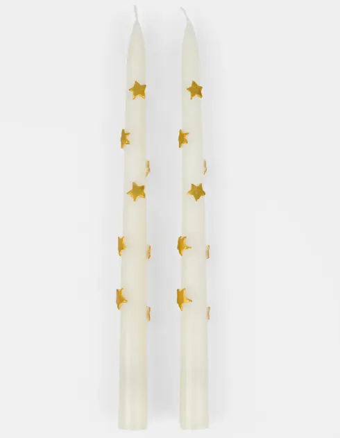Vela con estrellitas doradas