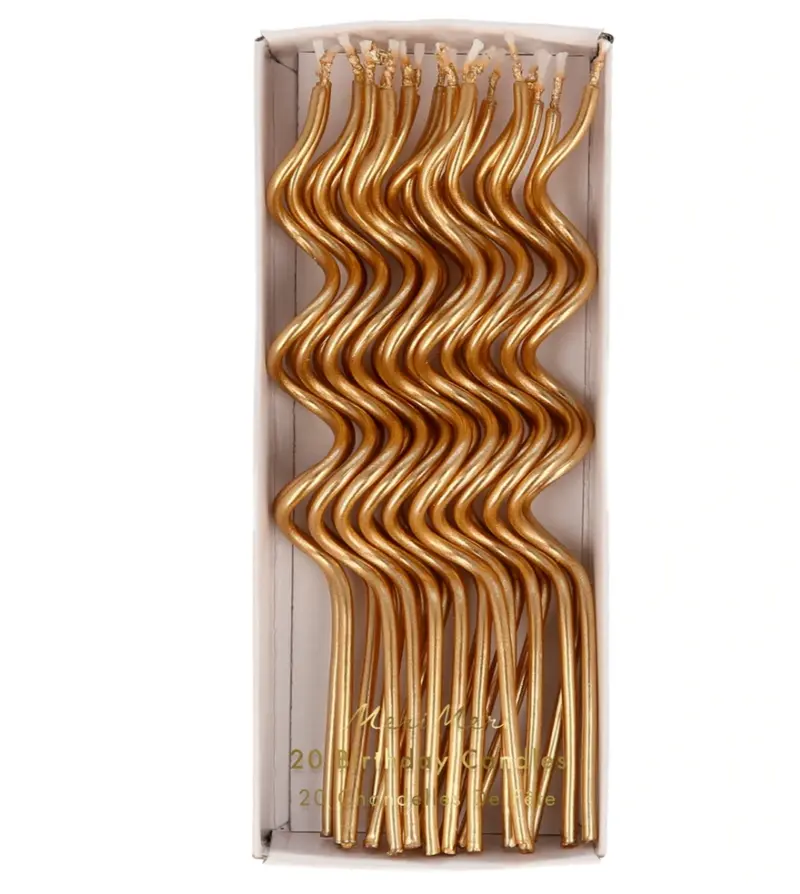 Velas de oro swirly