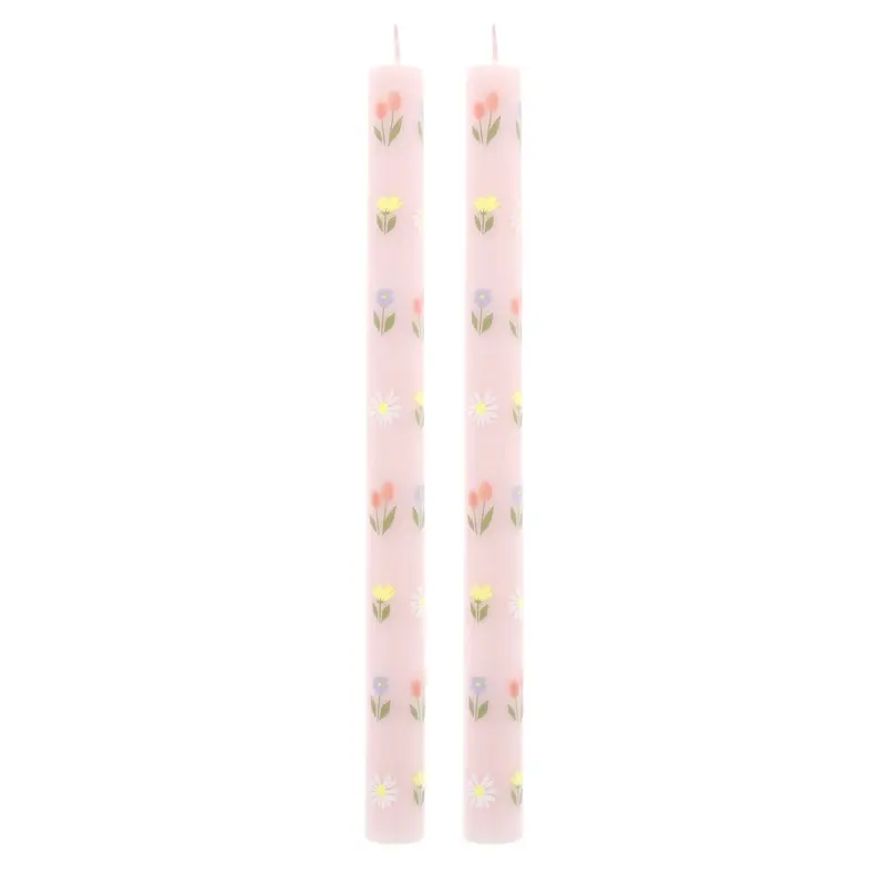 Velas rosas con flores